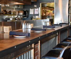 bar seating overlooking kitchen