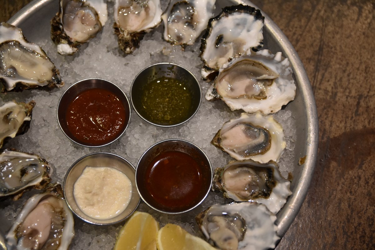 oyster platter with assorted sauces